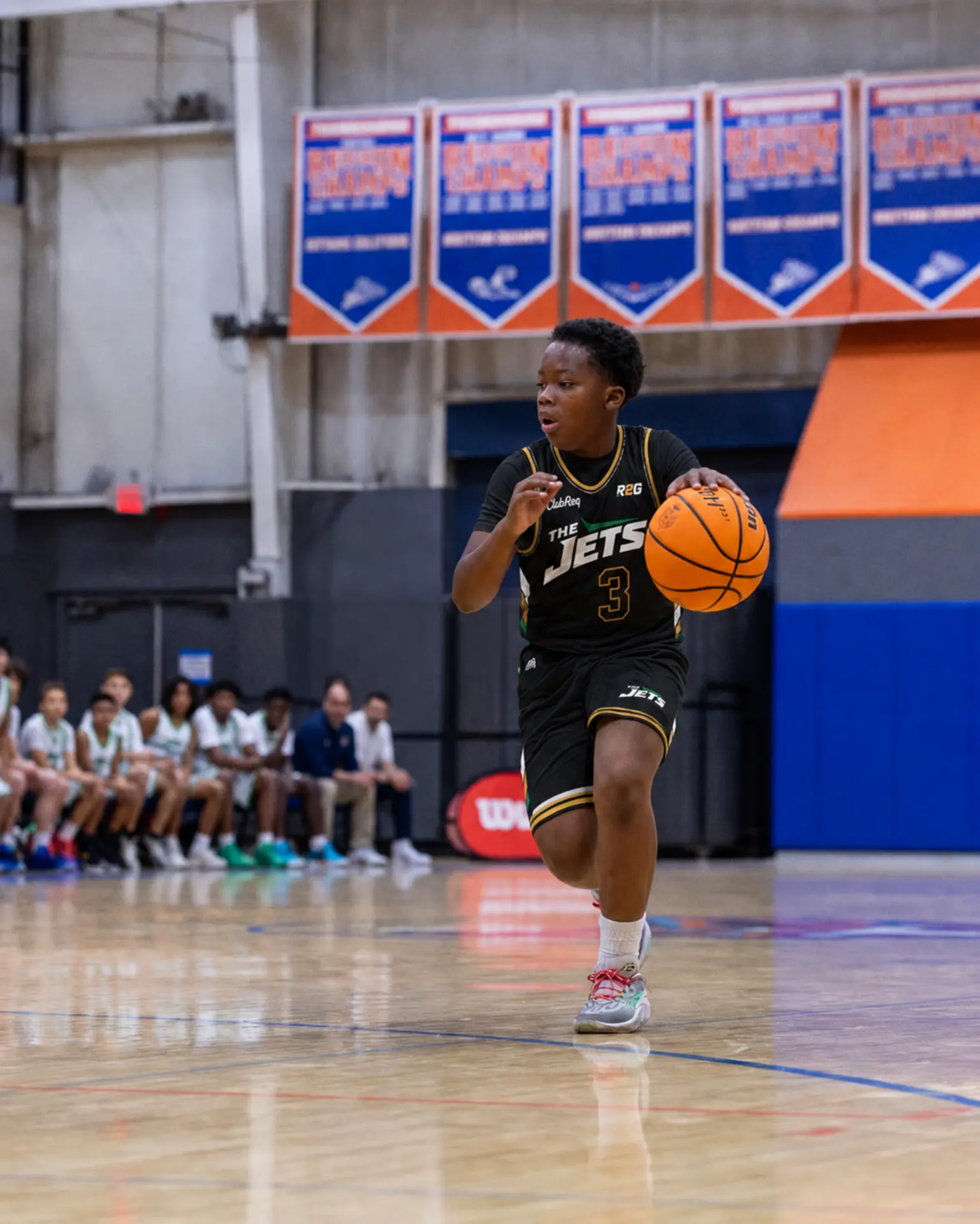 R2G Jets player driving the ball up court